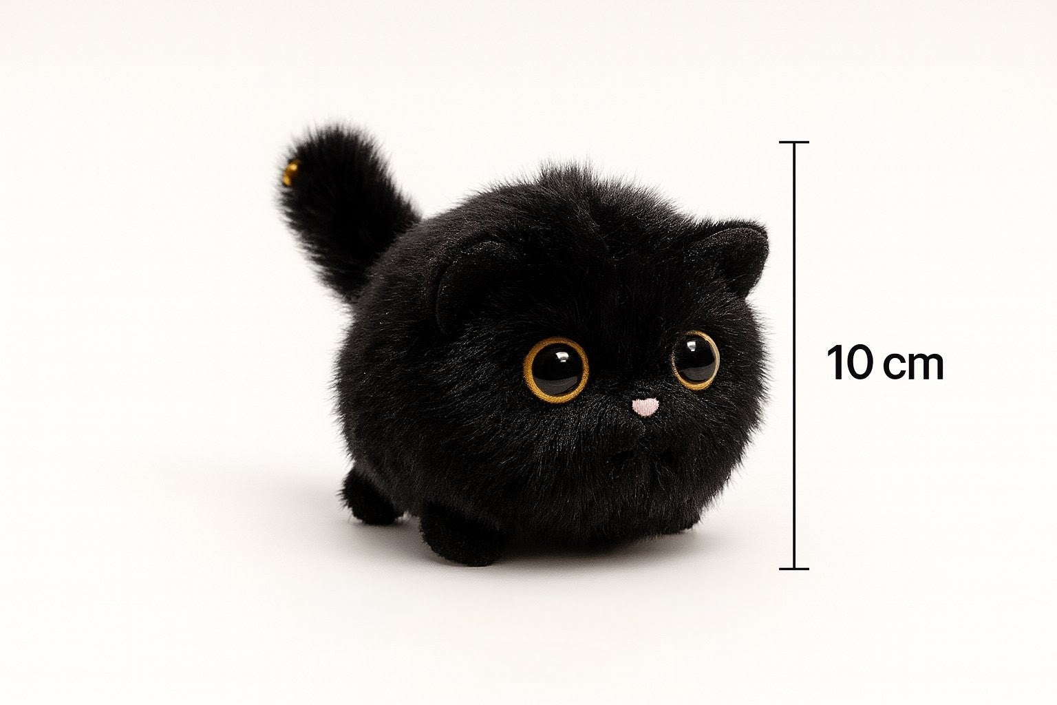 Linksmasis pakabutis kačiukas – patrauk uodegą ir ji suksis!